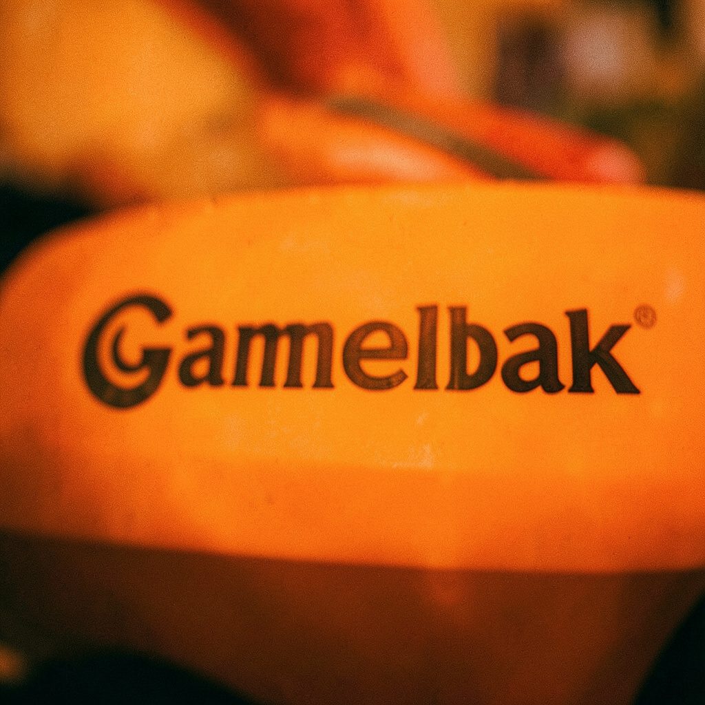 Camelbak logo in blue and orange